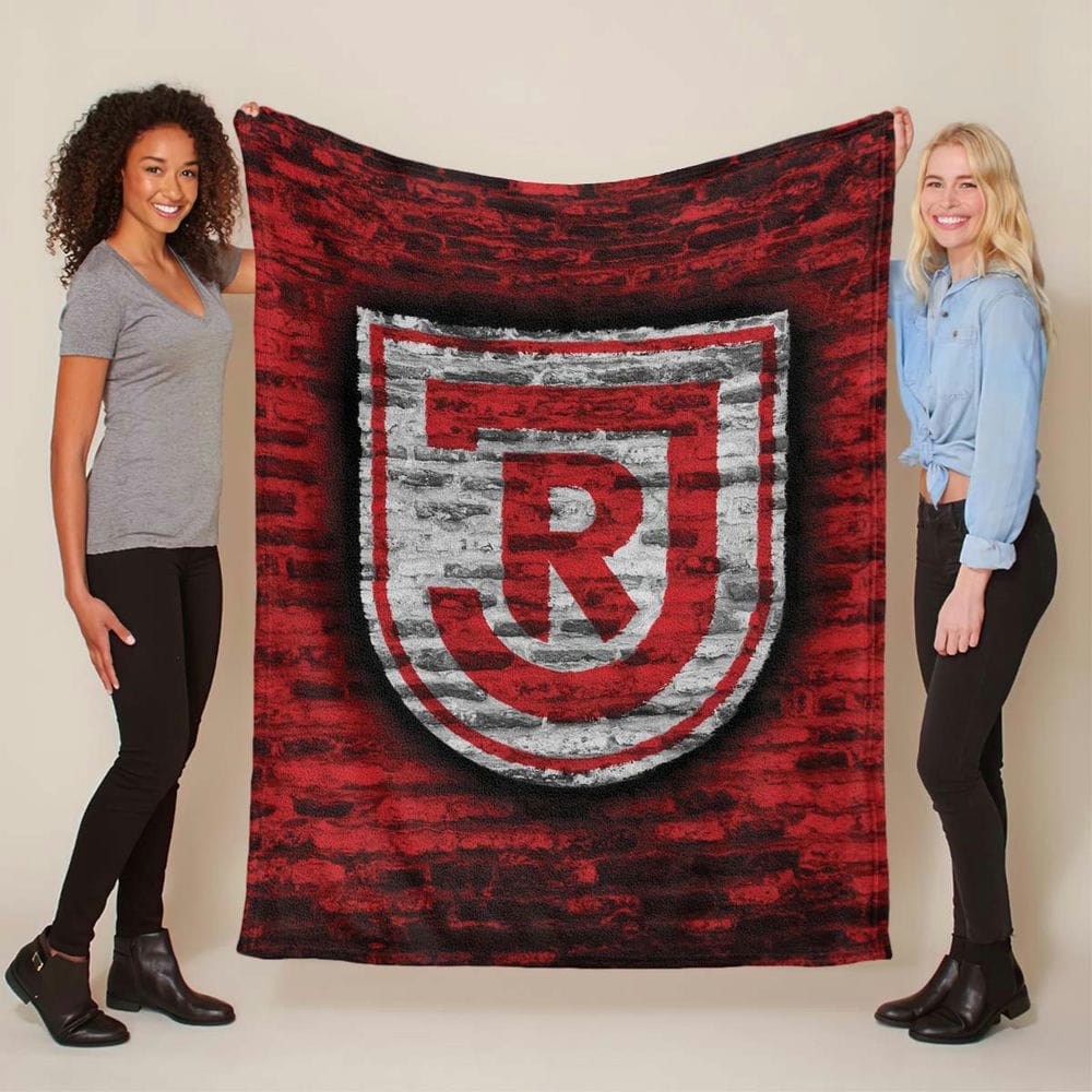 Rote Backsteinmauer des SSV Jahn Regensburg Fleecedecke - Decke